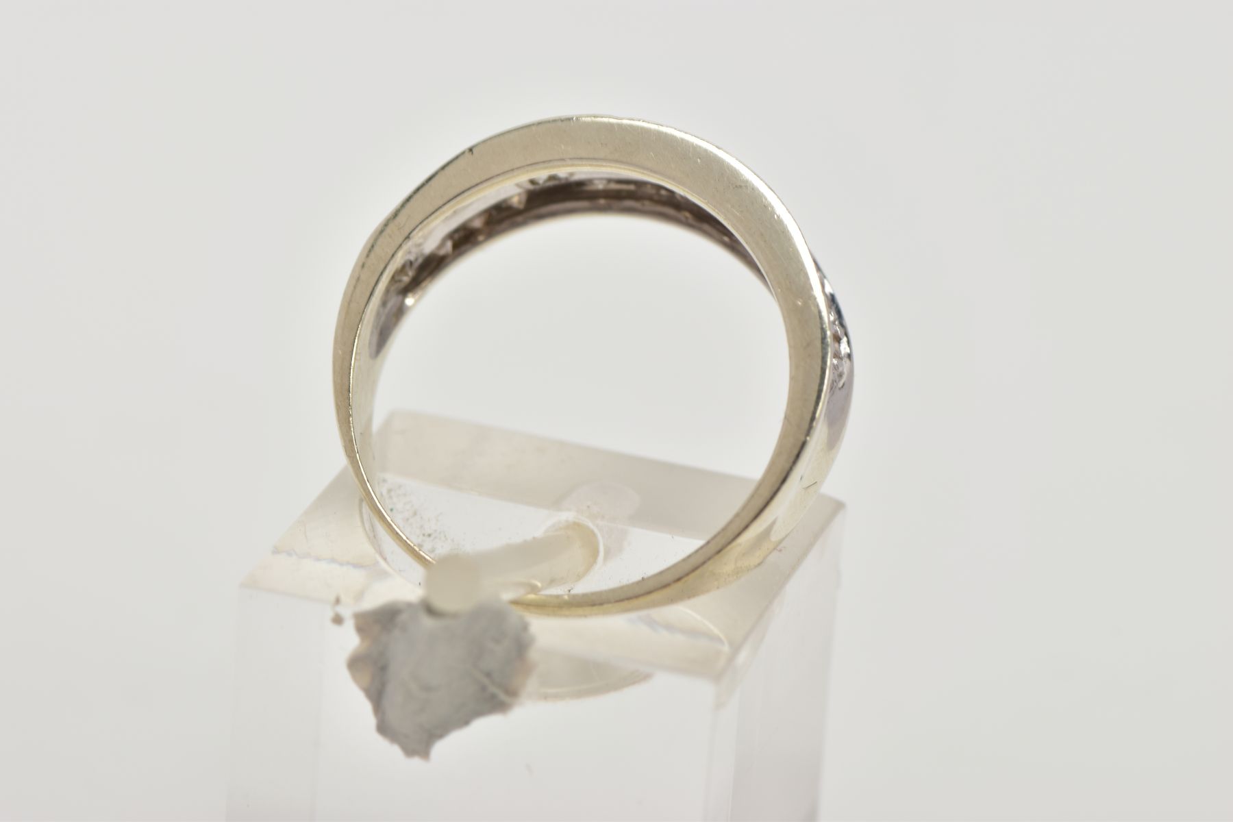 A 9CT WHITE GOLD DIAMOND DRESS RING, the tapered, slightly concave band set to the front half with - Image 3 of 4