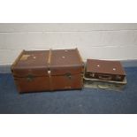 A VINTAGE CANVAS AND WOODEN BOUND TRAVELING TRUNK (missing internal tray and right handle) along