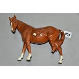 A BESWICK 976 LEFT FACING CHESTNUT MARE, height approximately 18.5cm(Condition:- left hind leg
