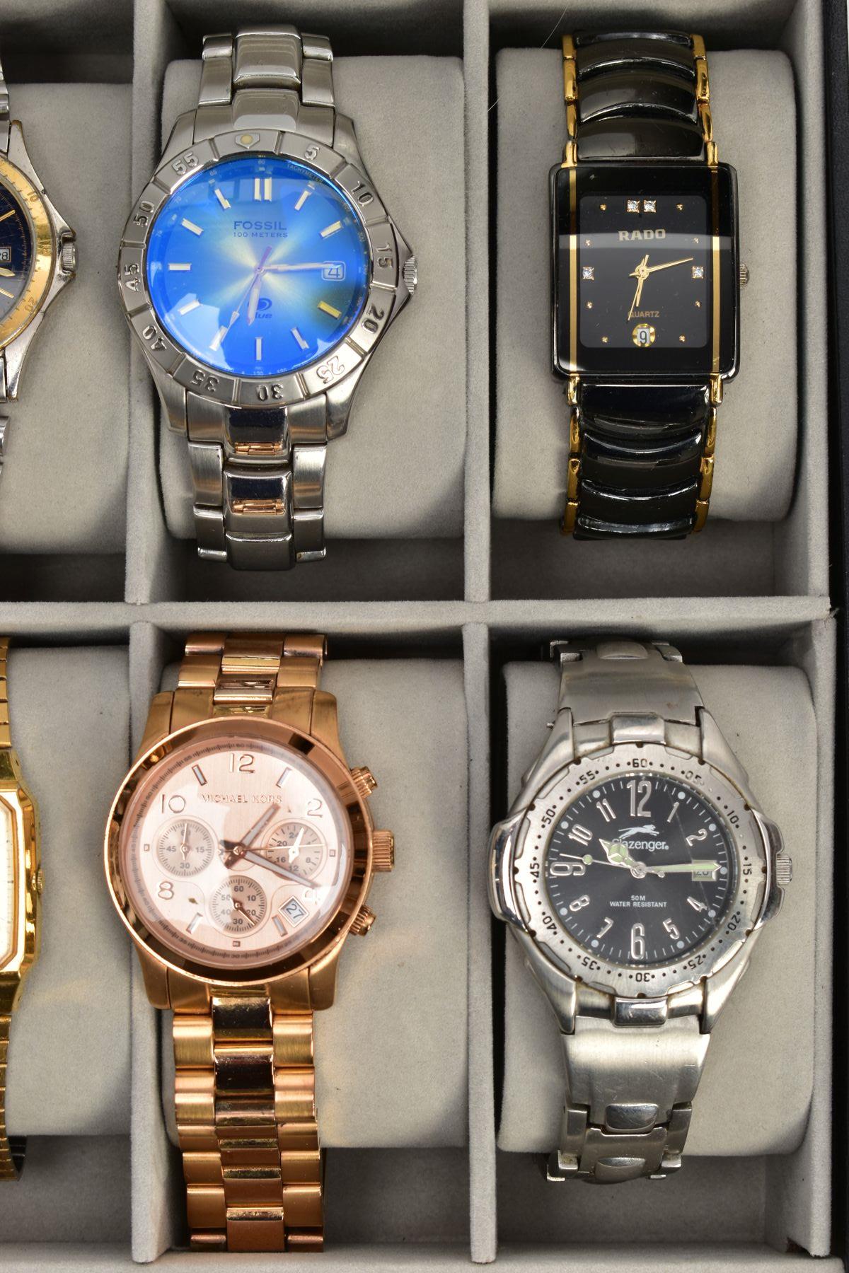 SELECTION OF WATCHES IN A DISPLAY BOX, display box encasing ten watches, names to include Casio, - Image 2 of 4