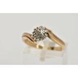 A 9CT GOLD DIAMOND CLUSTER RING, the cluster of a flower shape, set with single cut diamond