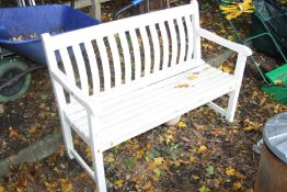 A WHITE PAINTED SLATTED GARDEN BENCH, width 123cm x depth 58cm x height 88cm