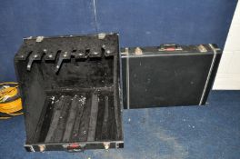 TWO STAGG FOLDING GUITAR STAGE STANDS closes to look like a cymbal case and holding six