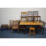 AN OAK DOUBLE FOLD OUT DINING TABLE, ten various chairs, stool and occasional table (13)