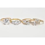 FIVE 9CT GOLD CUBIC ZIRCONIA SET DRESS RINGS, to include a large single stone ring, a three stone