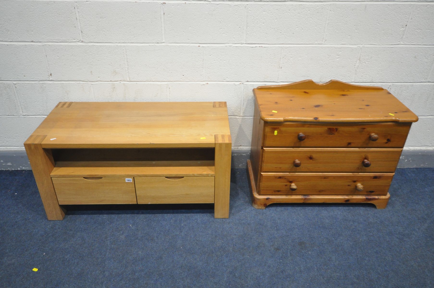 A SOLID OAK TV STAND with two drawers, width 101cm x depth 48cm x height 50cm, and a pine chest of