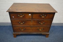 A GEORGIAN OAK CHEST OF TWO SHORT OVER THREE LONG DRAWERS, brass swan handles, on bracket feet,