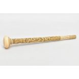 A CARVED IVORY PARASOL HANDLE, carved with a wraparound dragon, butterflies, foliage etc, tapered