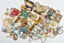 A SELECTION OF COSTUME JEWELLERY, to include, a mounted sovereign, Victorian brooch, selection of