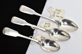 THREE SILVER TEASPOONS, fiddle pattern spoons, the first with engraved initials to the terminal,