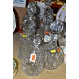 EIGHT CUT GLASS DECANTERS, comprising eight decanters with stoppers, three ceramic whisky and port