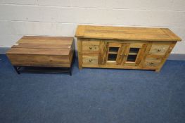 A HARDWOOD LOW TV STAND, with double cupboard doors flanked by two short drawers, width 135cm x