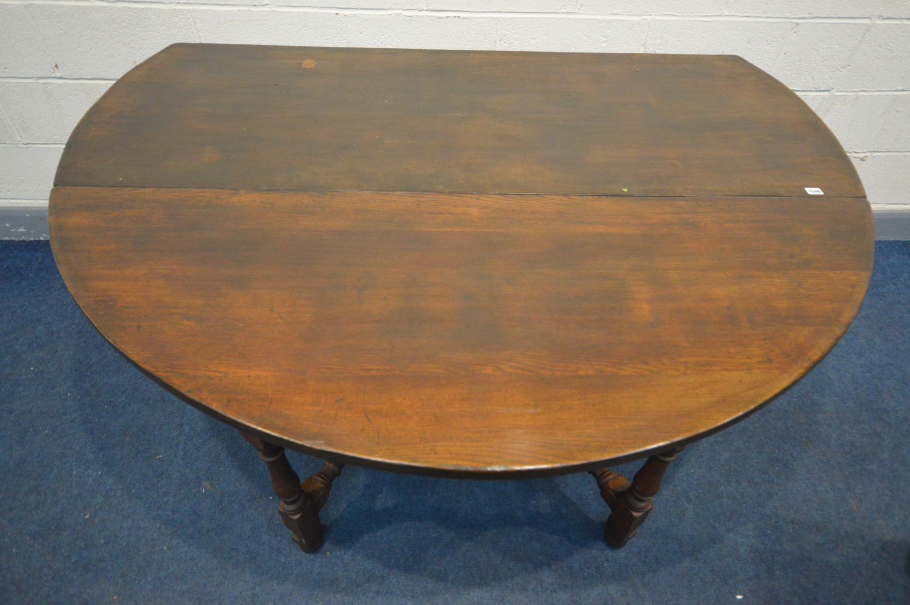 A LARGE REPRODUCTION GEORGIAN STYLE OAK GATE LEG TABLE, the drop leaves each with double legs, - Image 2 of 5