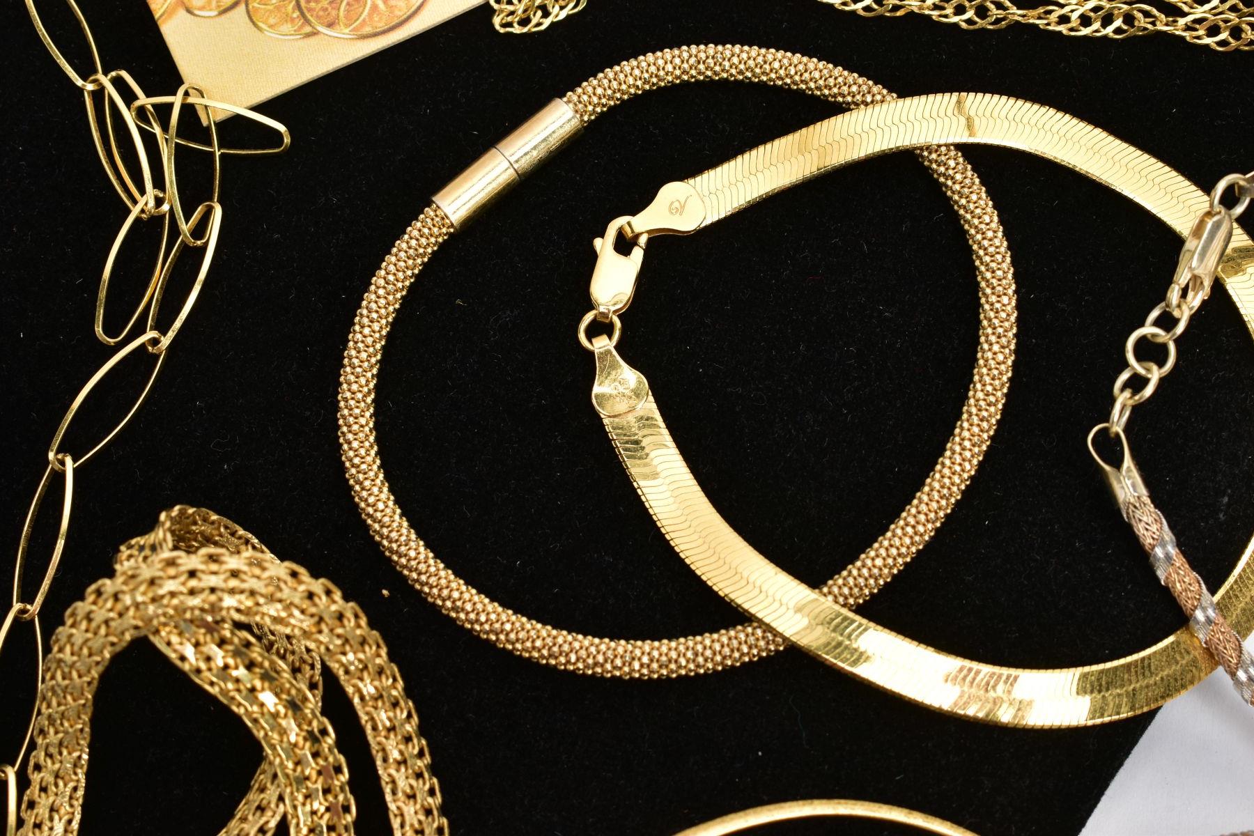 A BOX OF ASSORTED GOLD-PLATED JEWELLERY, to include a flat articulated necklace fitted with a - Image 5 of 6