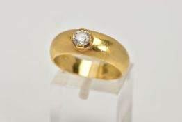 A SINGLE STONE DIAMOND BAND RING, the brilliant cut diamond claw set into a plain tapered band ring,