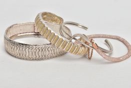 FOUR SILVER BRACELETS, to include a textured articulated bracelet, fitted with an integrated box