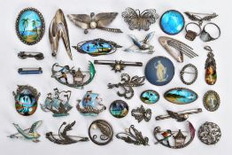 A SELECTION OF SILVER AND WHITE METAL BROOCHES AND PENDANTS, abstract harp brooch, approximate