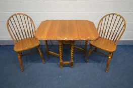 AN EARLY 20TH CENTURY OAK RECTANGULAR BARLEY TWIST GATE LEG TABLE, with pie crust edge, open width