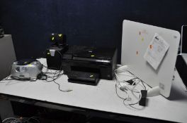 A PHILIPS GHETTO BLASTER, a HP Photosmart Plus printer, an a Sync computer speaker system and a B&