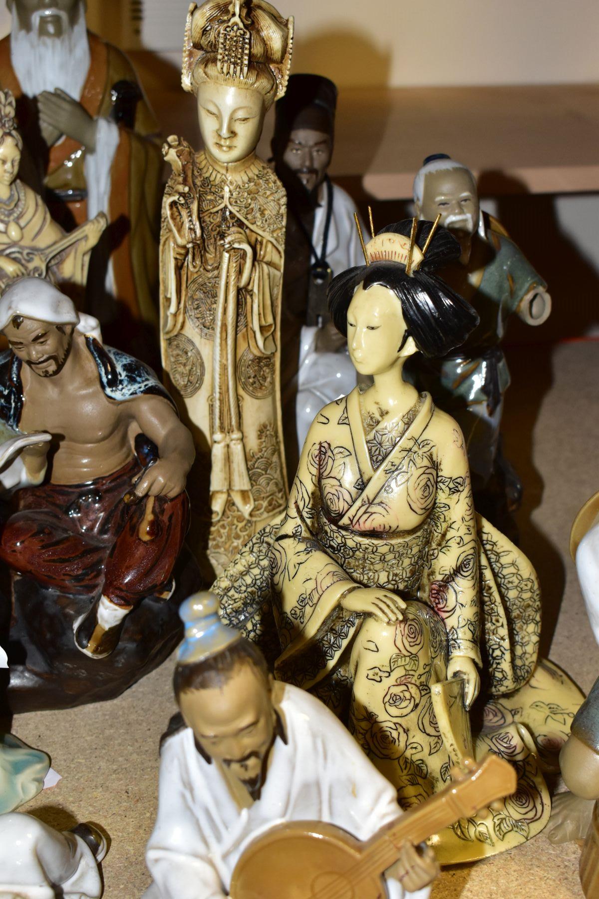 A GROUP OF MODERN ORIENTAL FIGURINES, to include fifteen figurines featuring people reading, fishing - Image 6 of 12