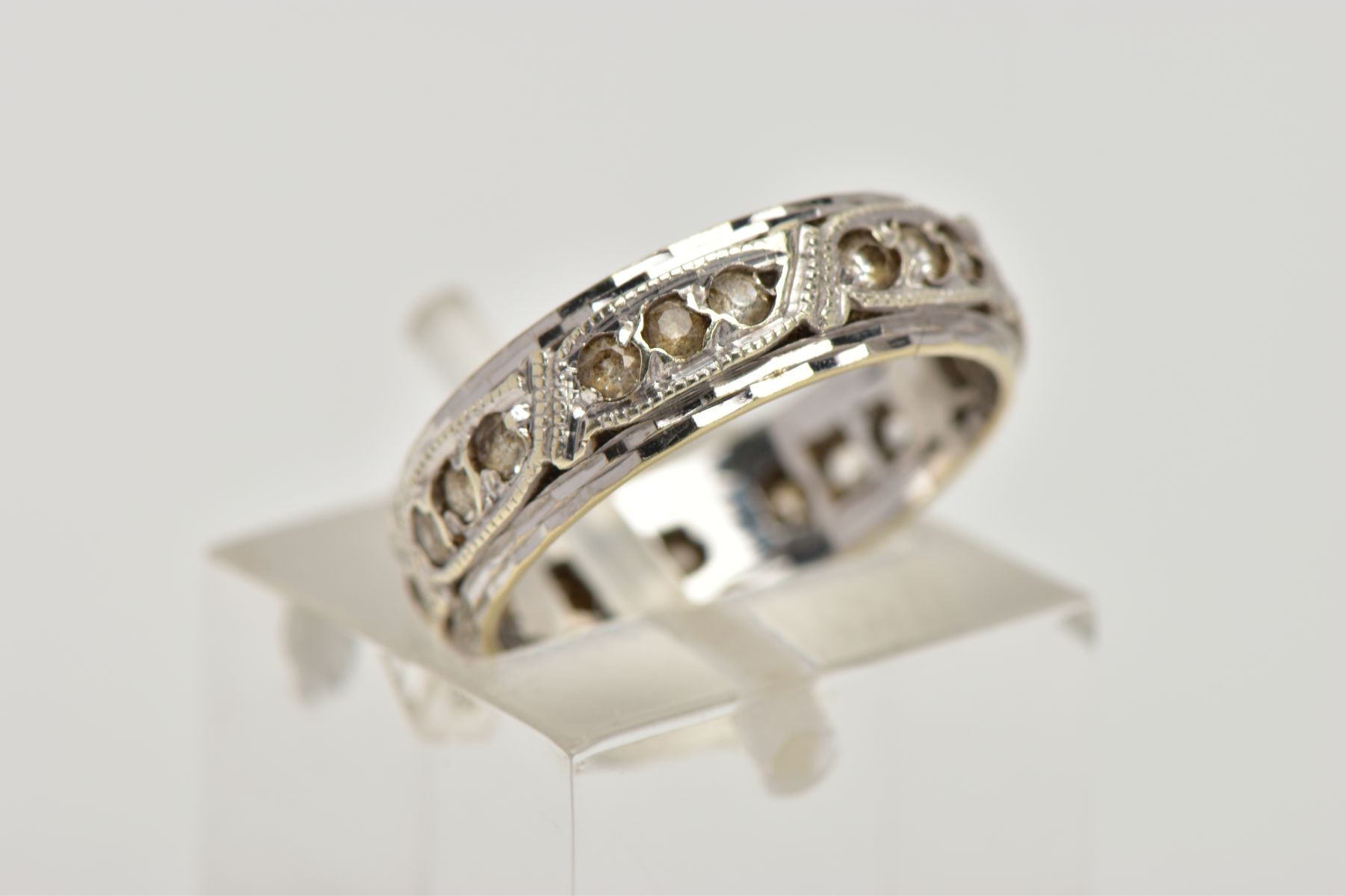 A 9CT WHITE GOLD ETERNITY RING, set with circular colourless gems, assessed as spinel, 9ct hallmark, - Image 4 of 4