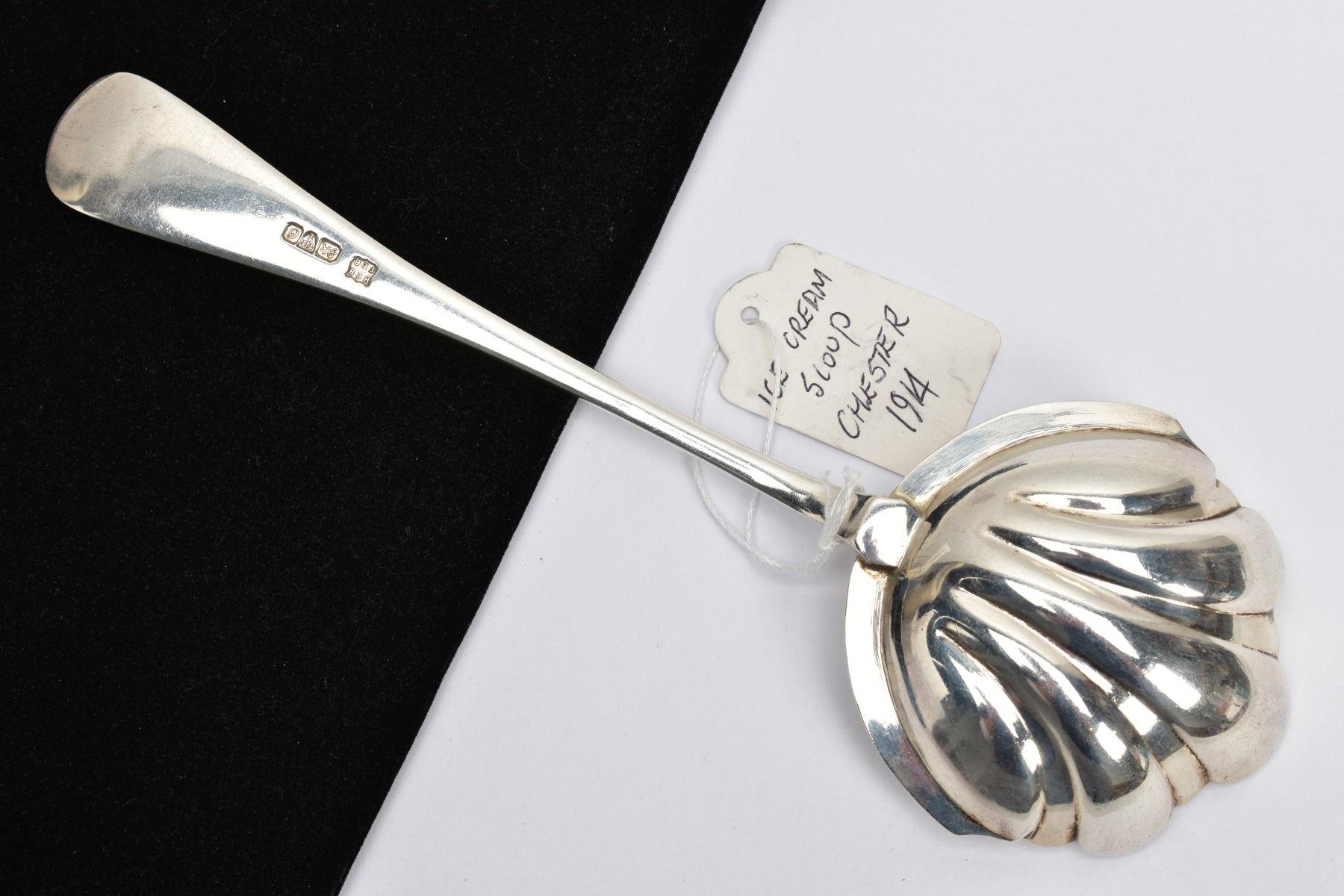 A SILVER ICE CREAM SCOOP, the bowl of a shell shape, shell pattern to the terminal with an - Image 3 of 4