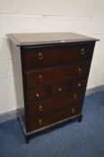 A STAG MINSTREL CHEST OF DRAWERS, width 82cm x depth 47cm x height 113cm