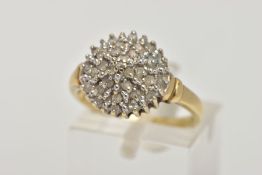 A 9CT GOLD DIAMOND CLUSTER RING, the cluster of a circular form, set with single cut diamond detail,