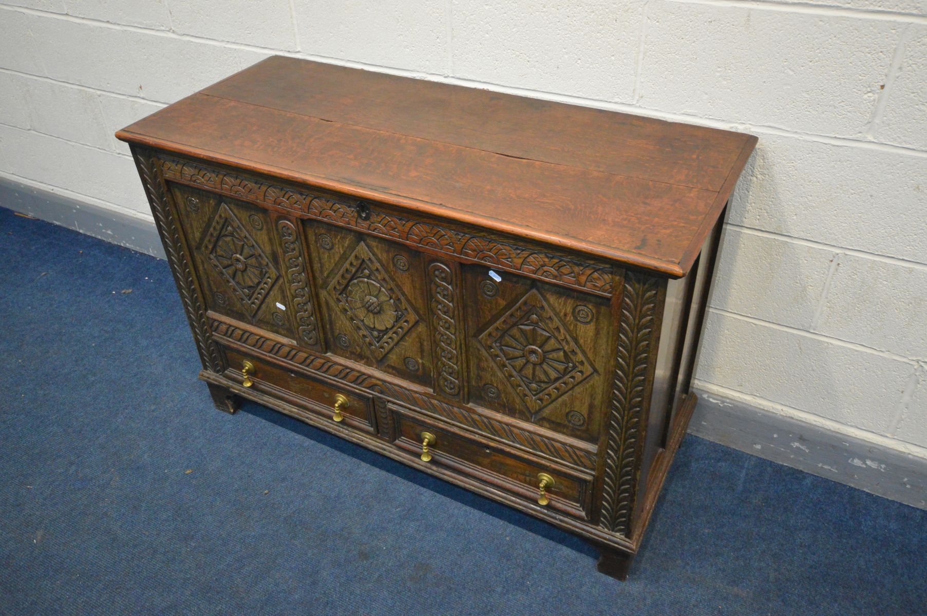 A 19TH CENTURY OAK MULE CHEST, three carved panels above two drawers, width 124cm x depth 52cm x - Image 3 of 4
