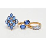 A 9CT GOLD KYANITE RING AND TWO 9CT GOLD TOPAZ RINGS, two stone ring, kyanite oval cut stones, cross