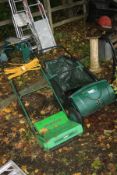 A COOPERS PUSH ALONG LEAF COLLECTOR together with a Qualcast RE35 electric scarifier (2)