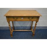 AN EARLY 20TH CENTURY OAK BARLEY TWIST SIDETABLE with a single drawer, width 76cm x depth 40cm x