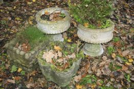 A PAIR OF CIRCULAR TWO PIECE PLANTERS with rose detailing and floral base, diameter 38cm x height