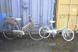 A VINTAGE RED LADIES CONTESSA BICYCLE, with Sturmey Archer gears and a rear luggage rack, 20 inch