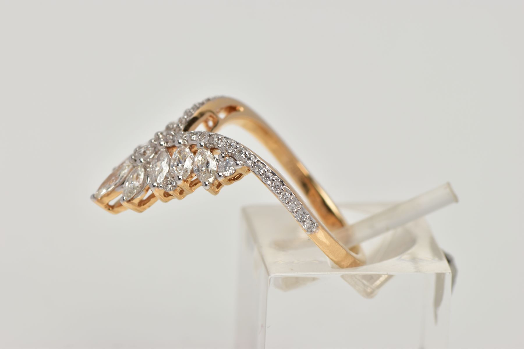 AN 18CT GOLD DIAMOND DRESS RING, the V-shape band set with brilliant cut diamonds, beneath a V-shape - Image 2 of 4