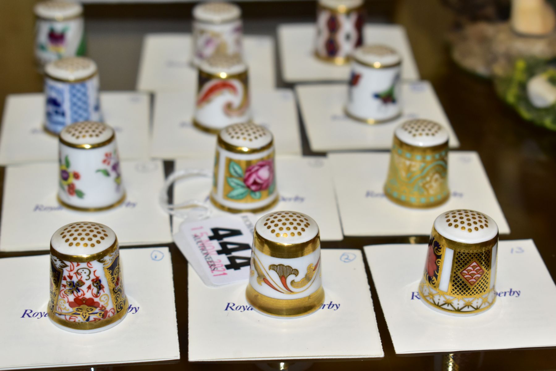 A COLLECTION OF TWENTY ONE ROYAL CROWN CHINA THIMBLES, including a selection from The Historical - Image 2 of 6