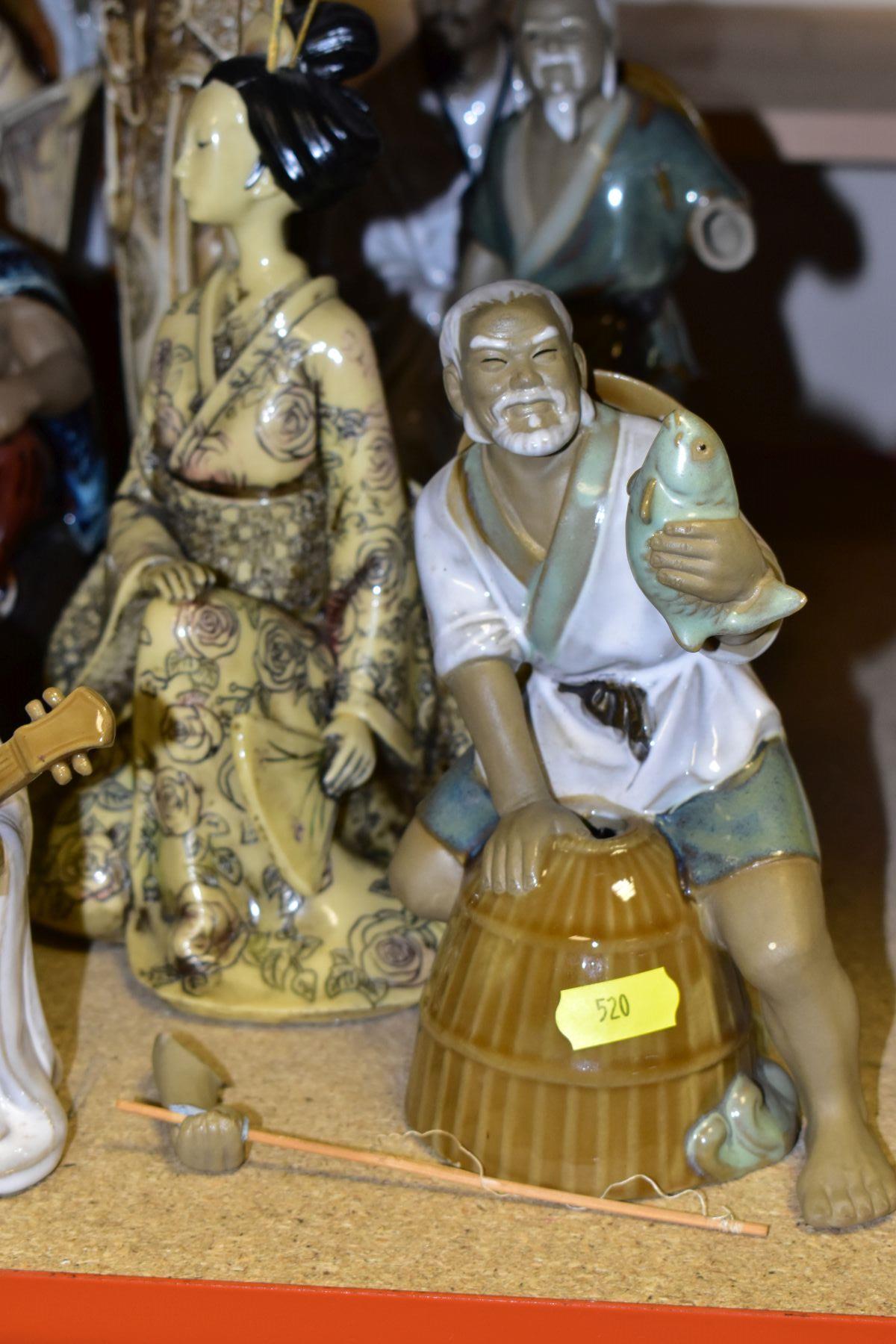 A GROUP OF MODERN ORIENTAL FIGURINES, to include fifteen figurines featuring people reading, fishing - Image 2 of 12