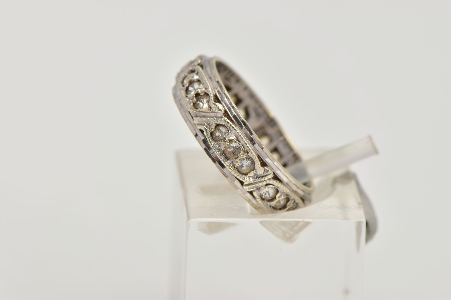 A 9CT WHITE GOLD ETERNITY RING, set with circular colourless gems, assessed as spinel, 9ct hallmark, - Image 2 of 4