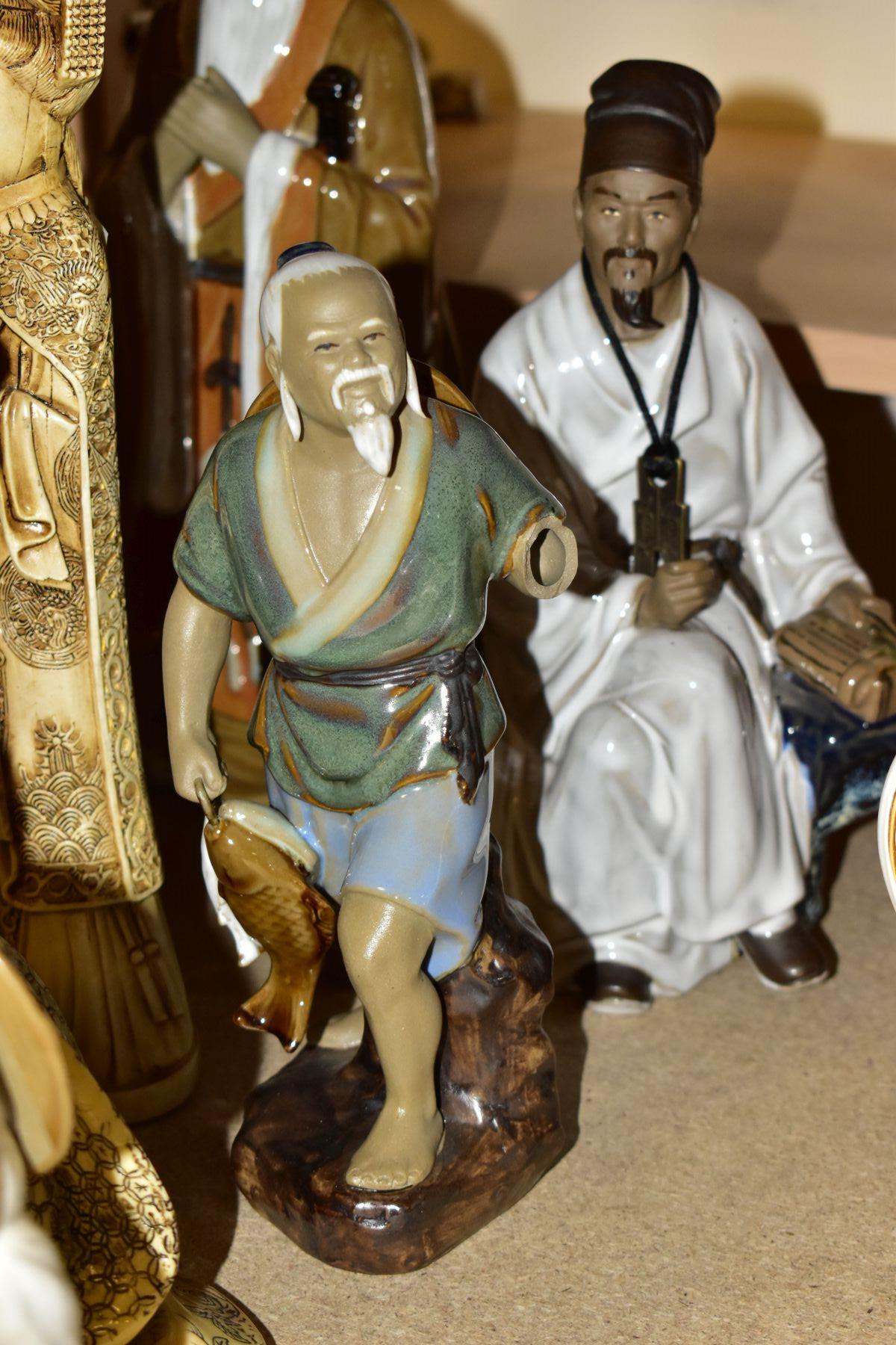 A GROUP OF MODERN ORIENTAL FIGURINES, to include fifteen figurines featuring people reading, fishing - Image 7 of 12