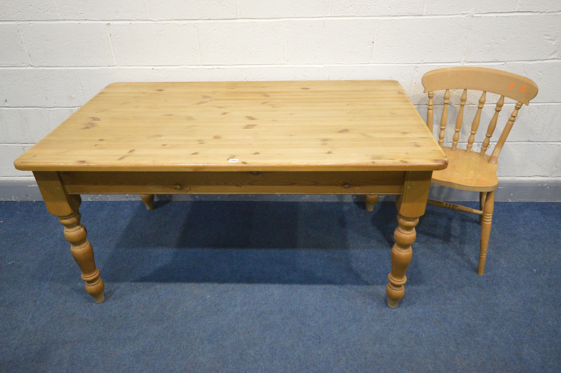 A PINE KITCHEN TABLE with a single drawer, length 153cm x depth 92cm x height 78cm and a beech chair