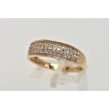 A 9CT GOLD DIAMOND HALF ETERNITY RING, designed with three rows of single cut diamonds, stamped