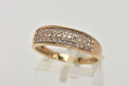 A 9CT GOLD DIAMOND HALF ETERNITY RING, designed with three rows of single cut diamonds, stamped