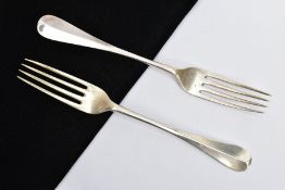 TWO EARLY 20TH CENTURY SILVER FORKS, Hanoverian pattern each with an engraved crest to the reverse