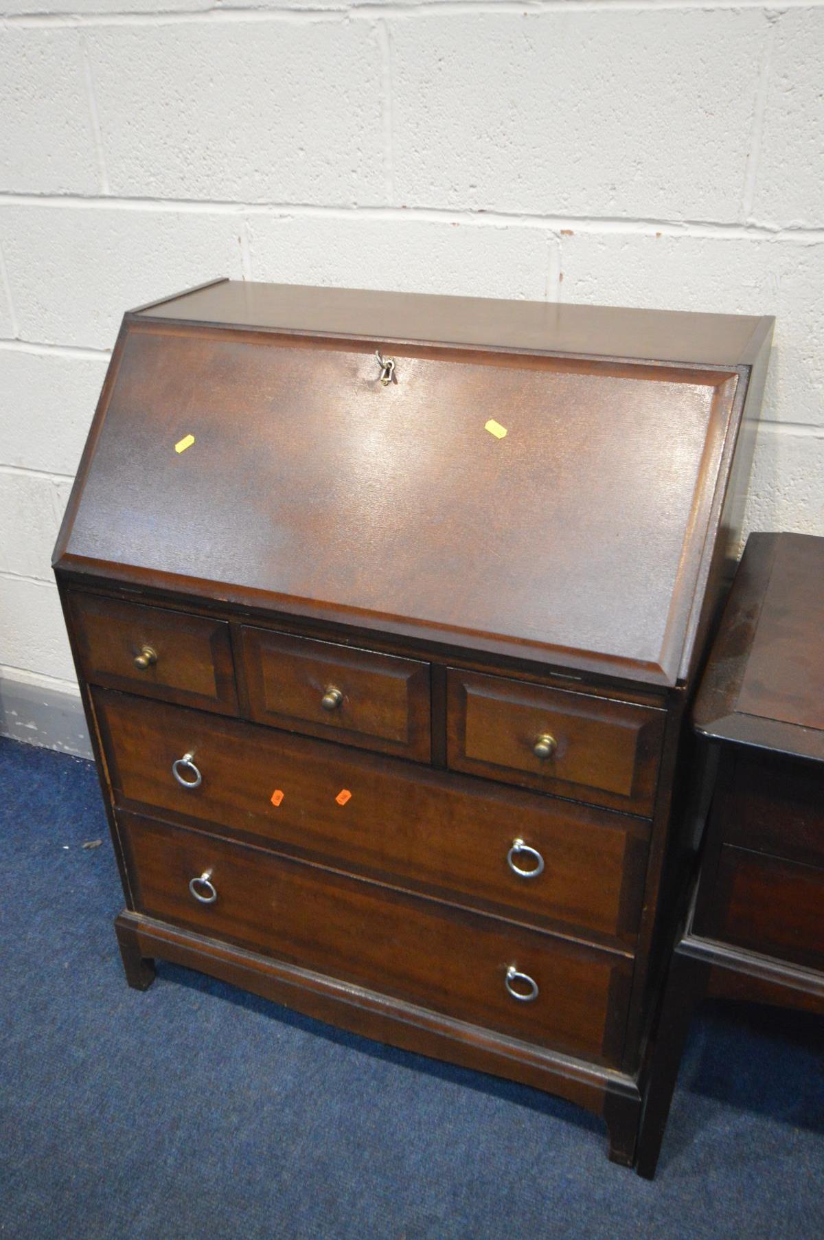 A STAG MINSTREL BEDROOM SUITE, comprising a triple door wardrobe, width 138cm x depth 58cm x - Image 2 of 5