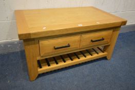 A SOLID LIGHT OAK COFFEE TABLE, with a single drawer, width 100cm x depth 60cm x height 50cm