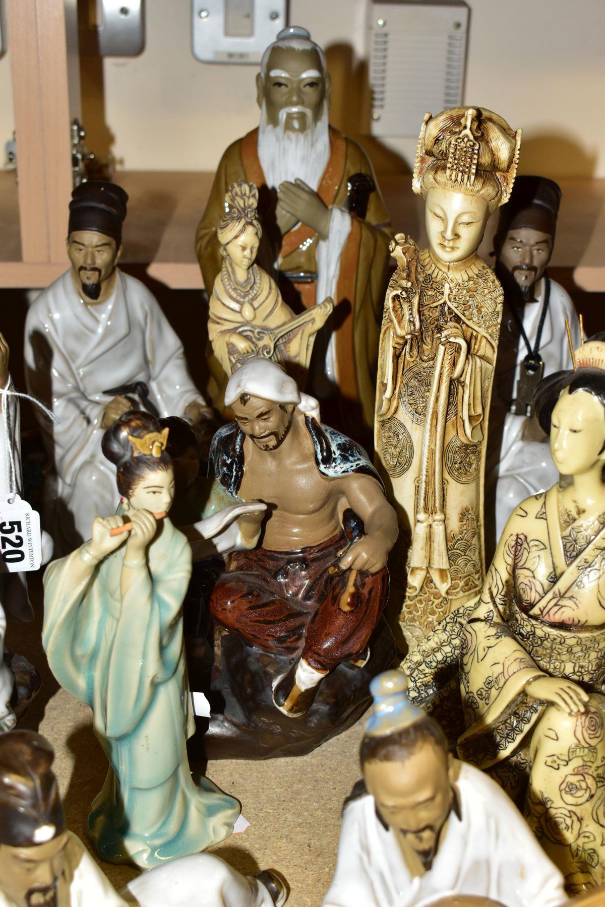 A GROUP OF MODERN ORIENTAL FIGURINES, to include fifteen figurines featuring people reading, fishing - Image 5 of 12