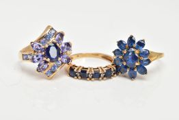 THREE 9CT GOLD SAPPHIRE RINGS, to include an eleven stone cluster ring, oval cut sapphire stones,