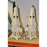 A PAIR OF PETER WELDON CREAMWARE ELEPHANT OBELISKS, comprising each elephant standing on a cast