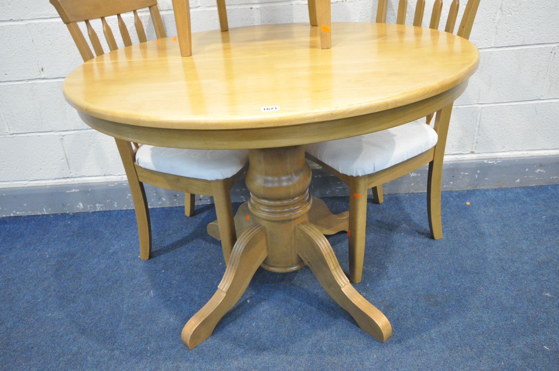 A MODERN BEECH CIRCULAR EXTENDING PEDESTAL DINING TABLE, with an additional fold out leaf, - Image 3 of 3