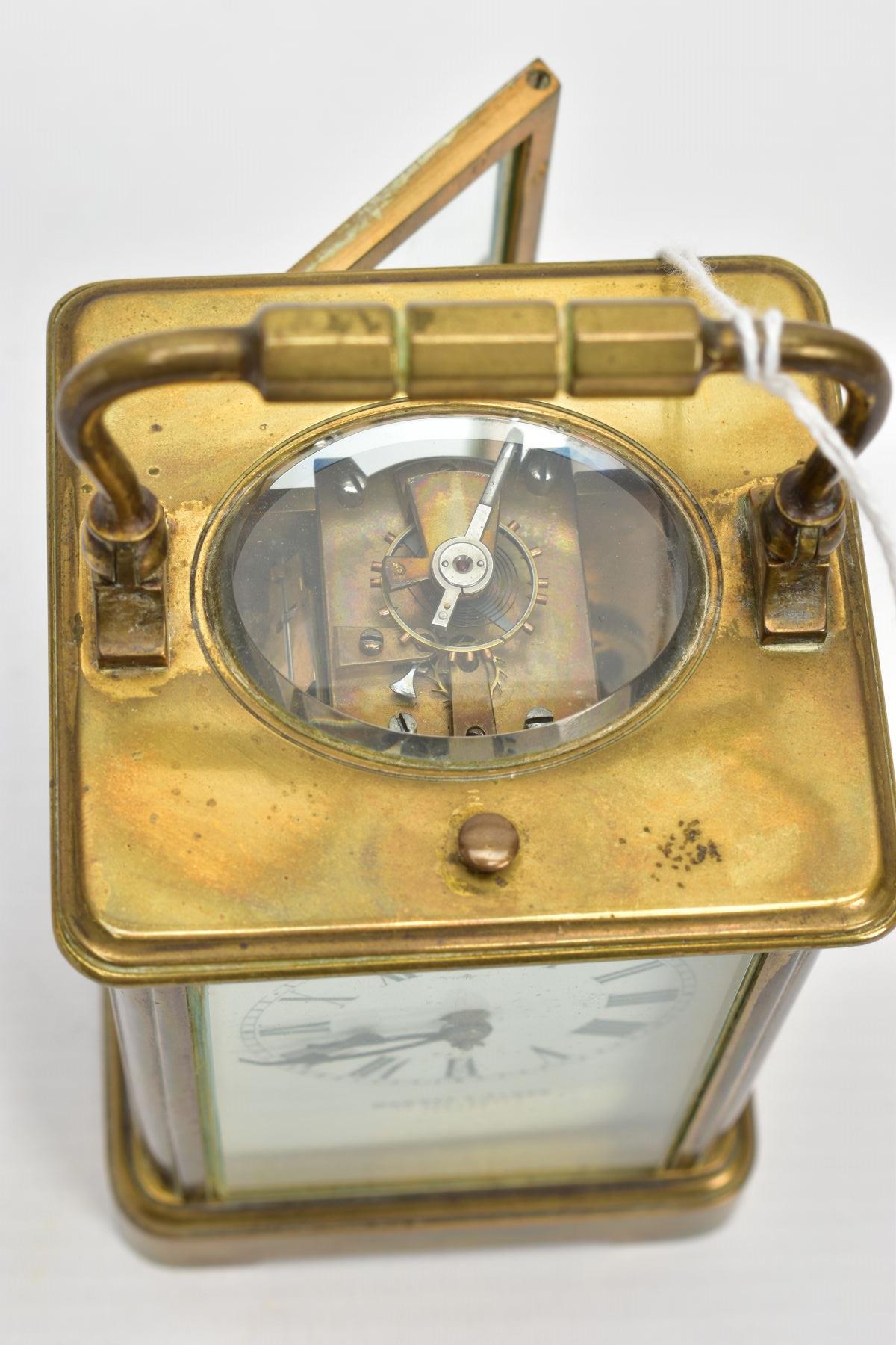 A 'HOWELL & JAMES' BRASS CARRIAGE CLOCK, white dial signed 'Howell & James' to the-Queen London, - Image 7 of 7